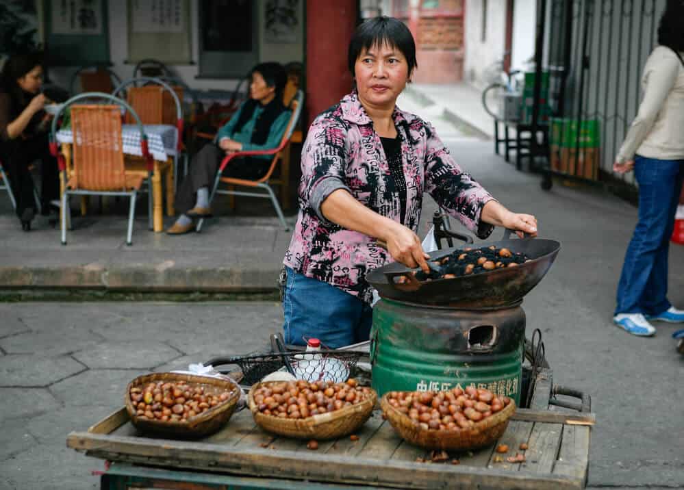 Street Vendor Selling Roasted Chestnuts